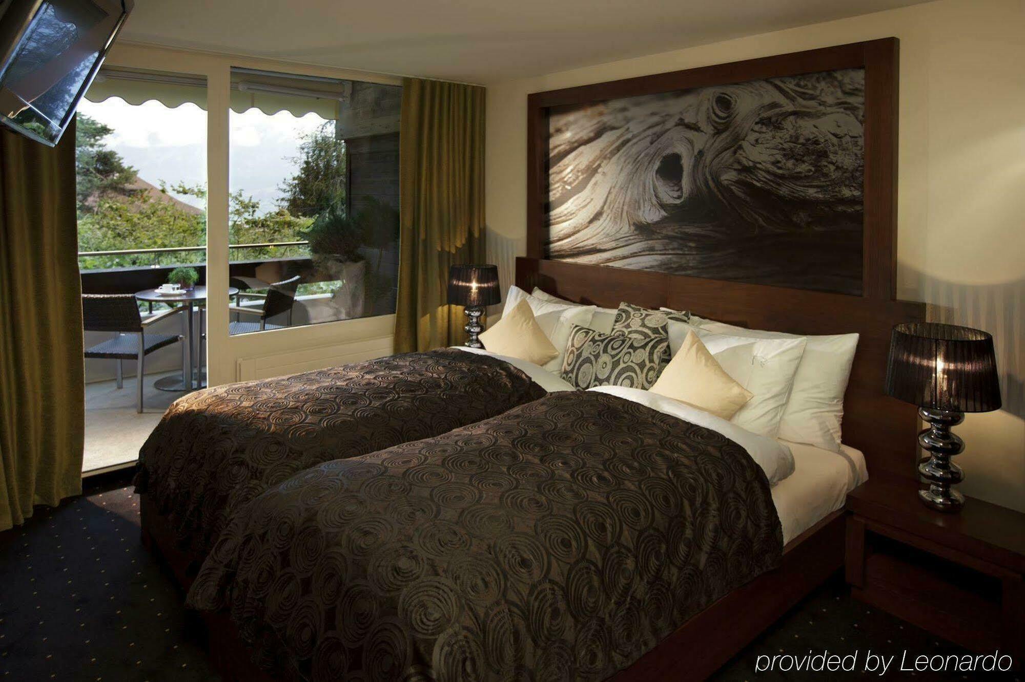 Hotel Baeren Sigriswil Oda fotoğraf